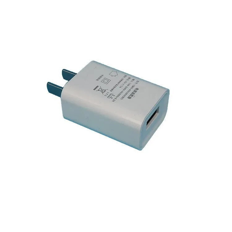 White USB charger with CE and FCC certification markings for mobile phones