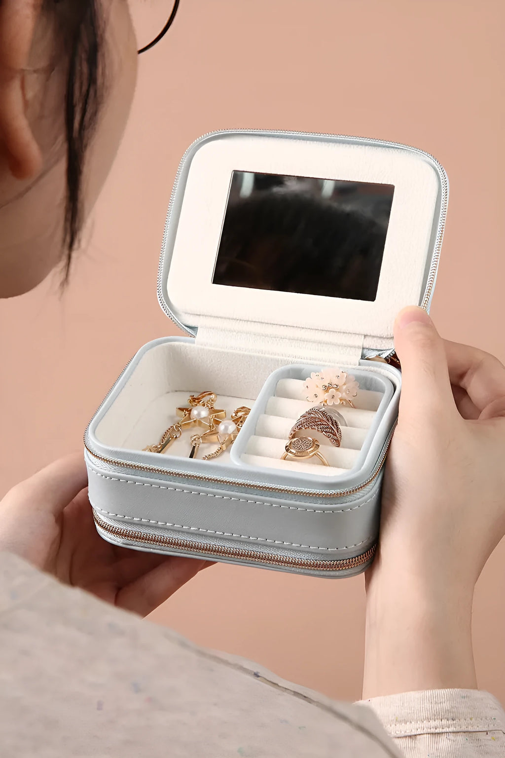 Portable double-sided travel jewellery box in blue with PU leather exterior and pearl velvet lining