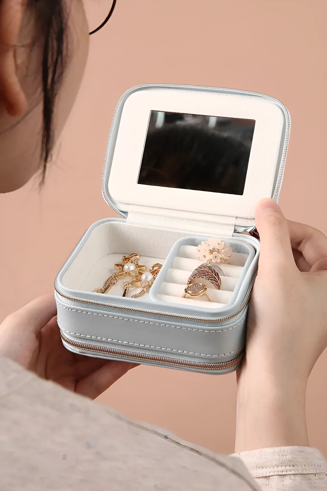 Portable double-sided travel jewellery box in blue with PU leather exterior and pearl velvet lining