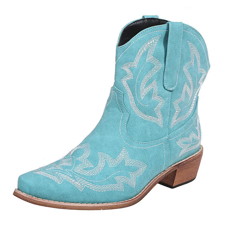 Blue women's cowboy boots with embroidery, a low wedge heel, and a pointed toe.