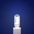 Compact white USB-powered LED baby night light with choice of warm or white light colour.