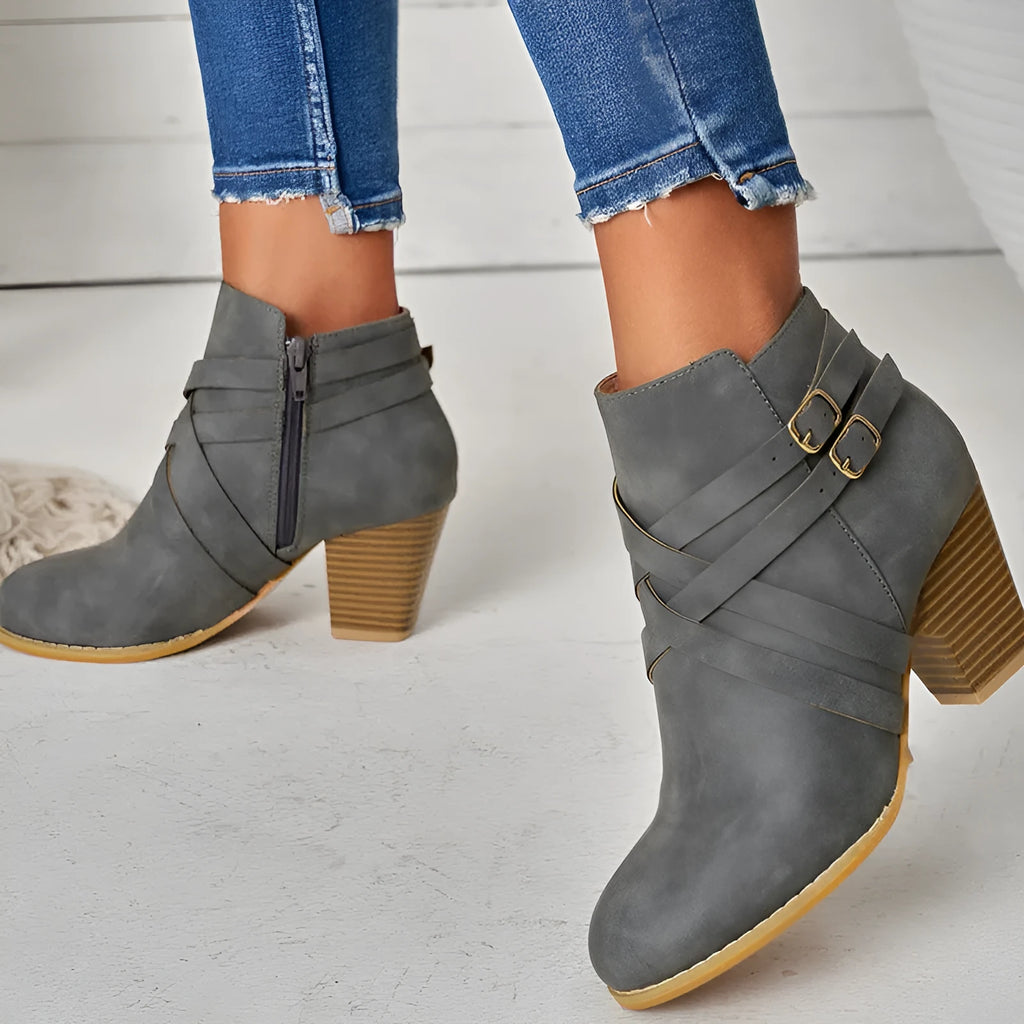Plus size women's grey ankle boots with a 7cm heel and side zipper.