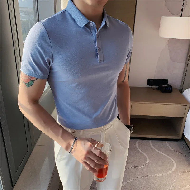 Man's solid colour cotton blend polo shirt with lapel collar and short sleeves in Korean style fit.