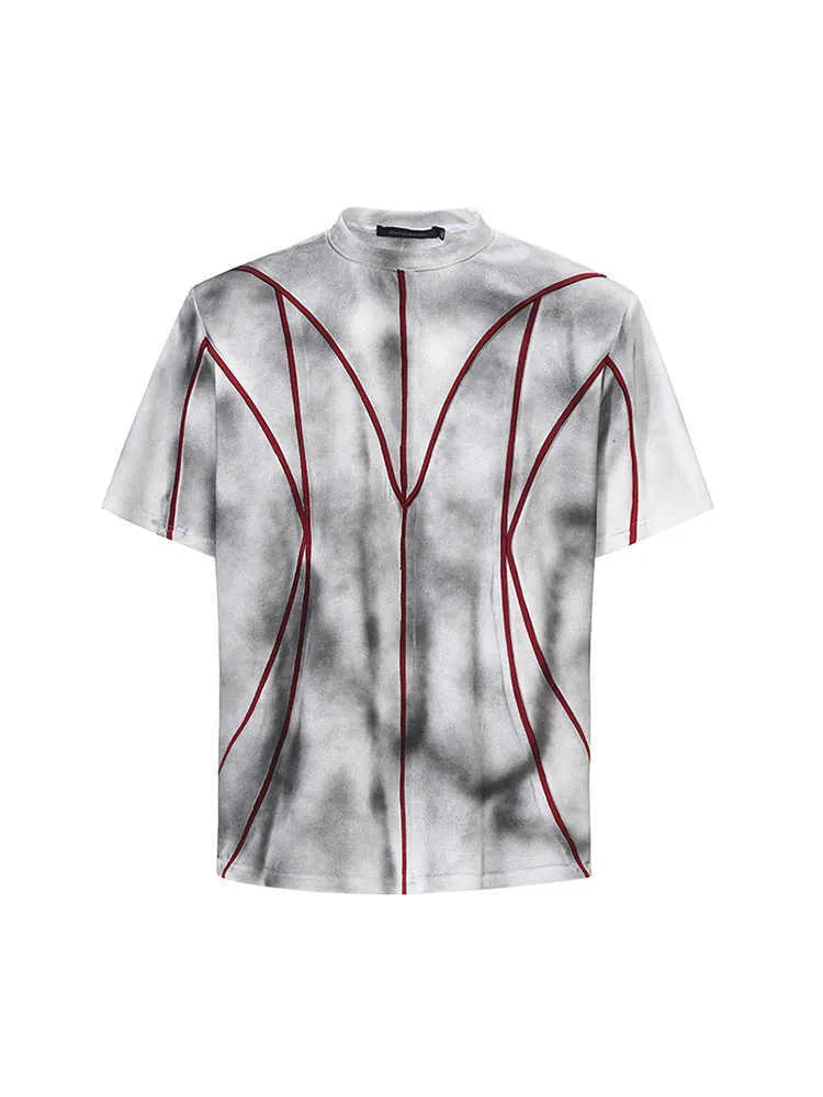Men's grey T-shirt with padded shoulders and raised line patchwork detailing on the front.