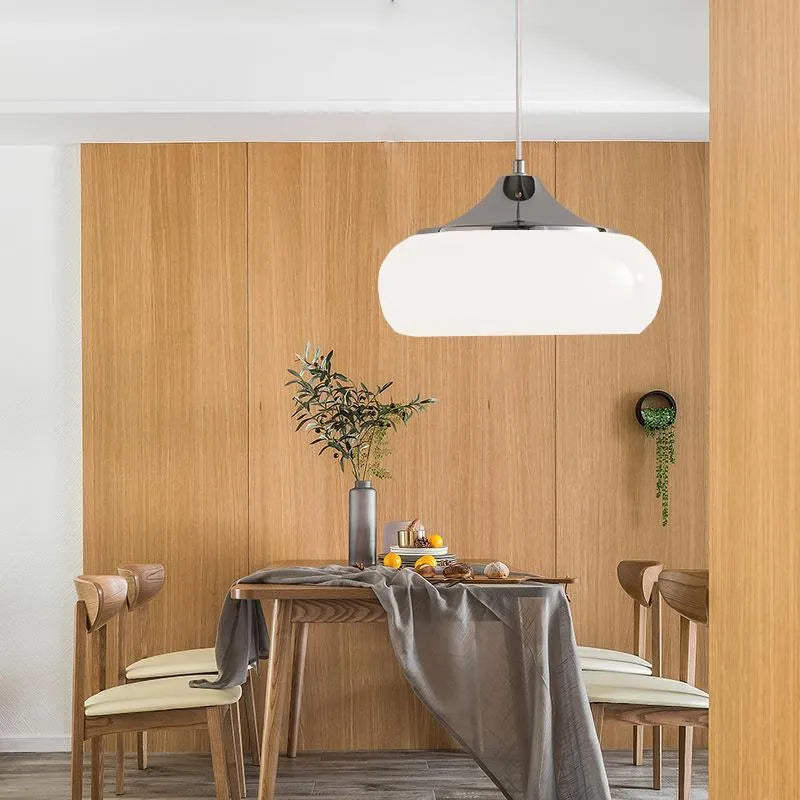 Bauhaus style three headed egg tart pendant light with glass shades in milky white finish