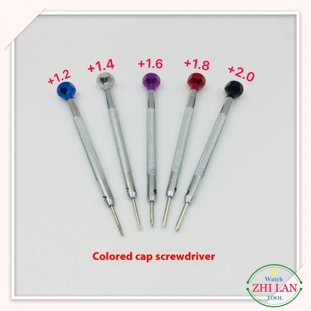 Six colour-coded watch repair screwdrivers with copper handles in an aluminium case.
