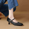 Women's black square toe stiletto ankle-strap shoes with horse hair upper and buckle fastening