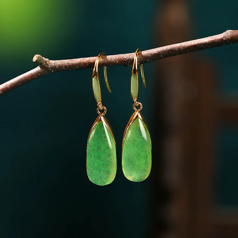 Chinese style geometric earrings with water droplet design in jade colour on copper base