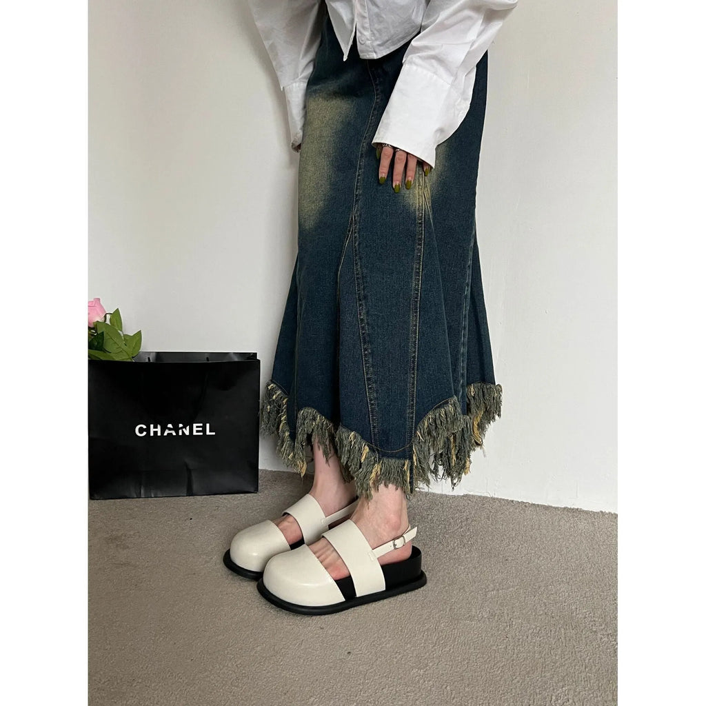 Korean style closed toe sandals with an ankle strap buckle in black, brown, and apricot colours.