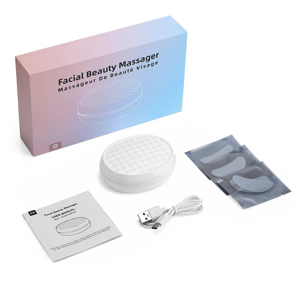 White wireless red light EMS eye and facial massager device for home skincare