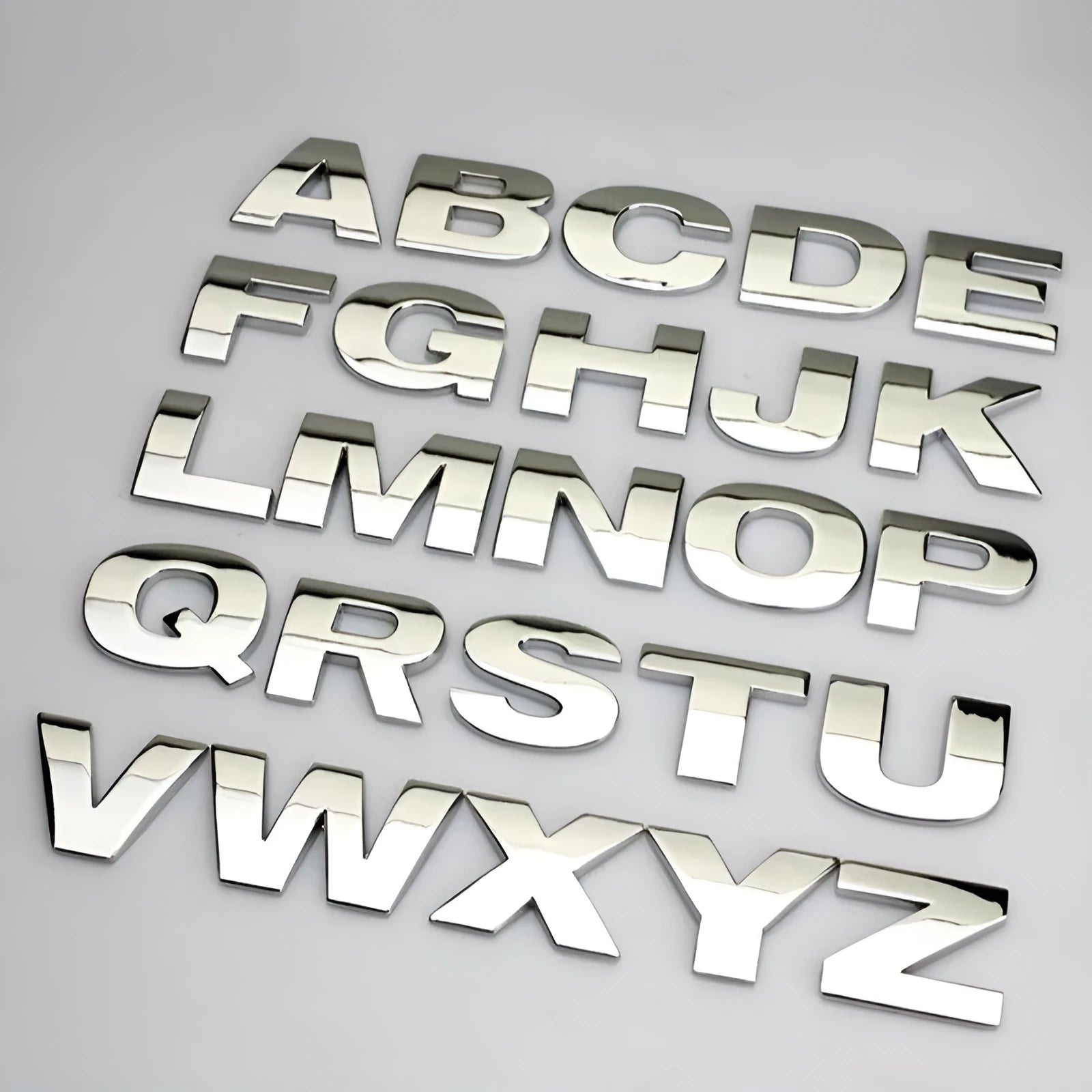 3D zinc alloy car letter sticker showing raised metal construction on vehicle surface