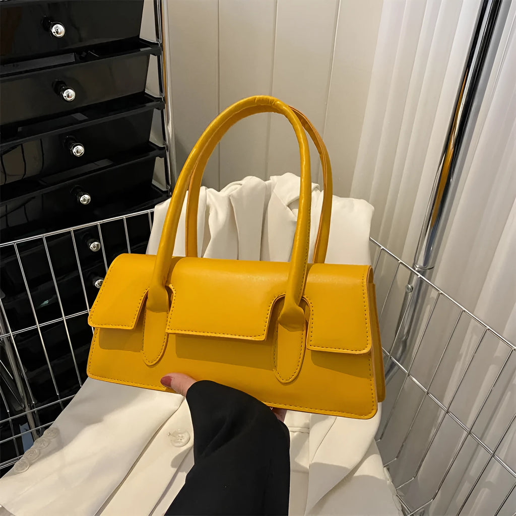 Women's retro square PU shoulder bag with stitching details and sandwich pocket exterior