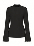 Long sleeve round neck top with lantern sleeves in brushed polyester fabric, black colour with sunken stripe pattern
