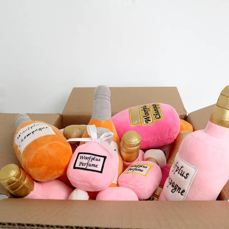 Soft green plush pet toy shaped like a wine bottle for cats and dogs to play with.