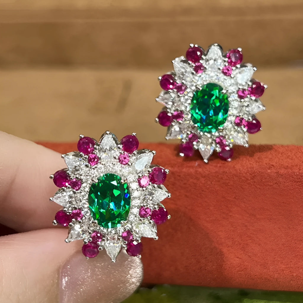 White gold stud earrings with oval zircon stone and geometric floral design on copper base