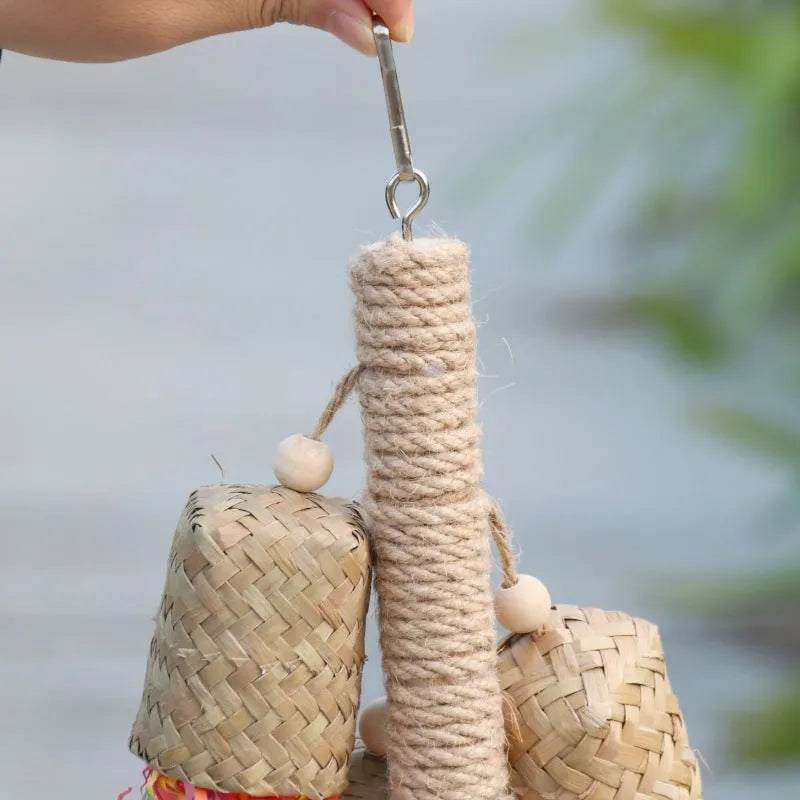 Colourful shredded paper and wood parrot hanging toy with sisal rope for medium birds.