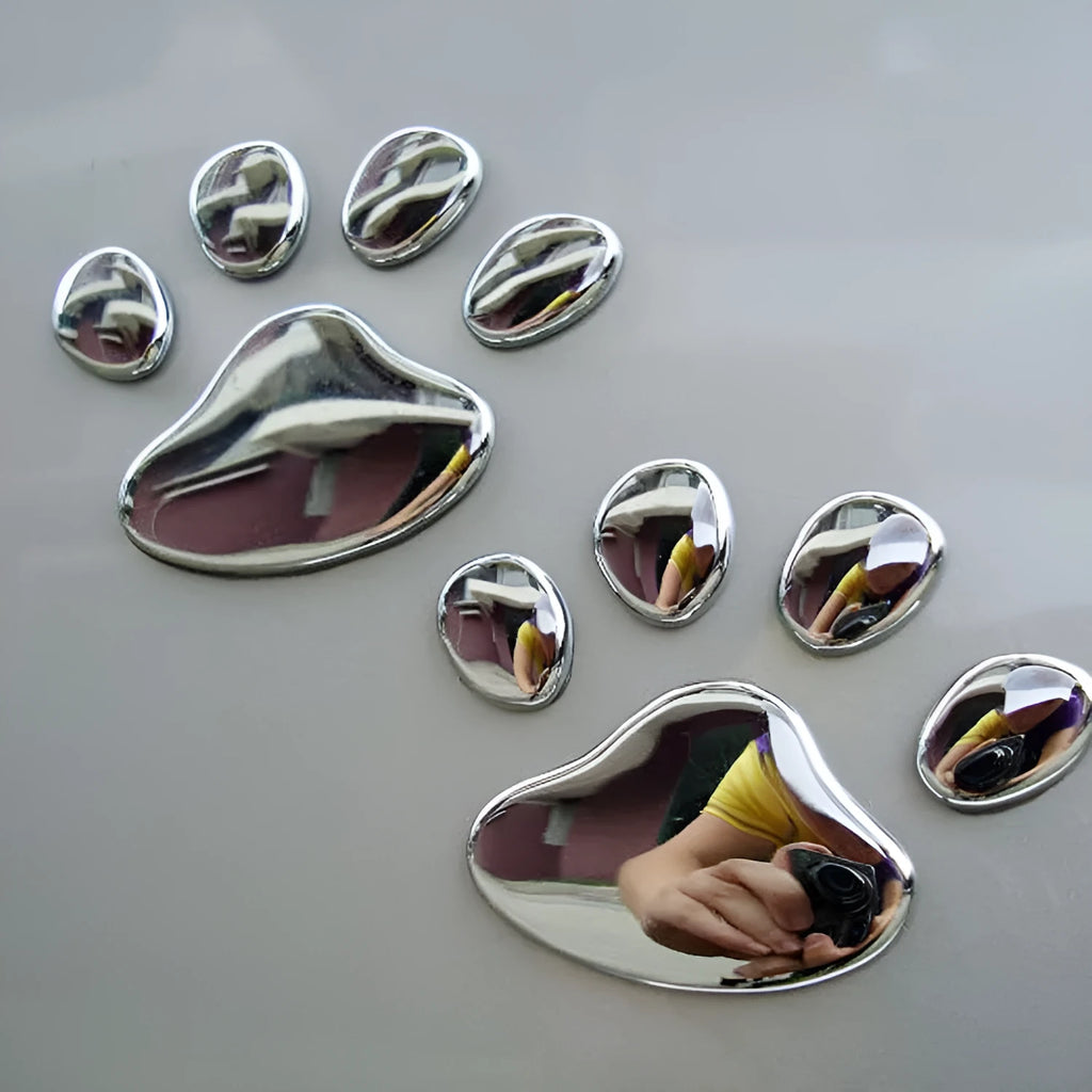 PVC hand-shaped brush dog footprint car sticker on a vehicle bumper in black colour.