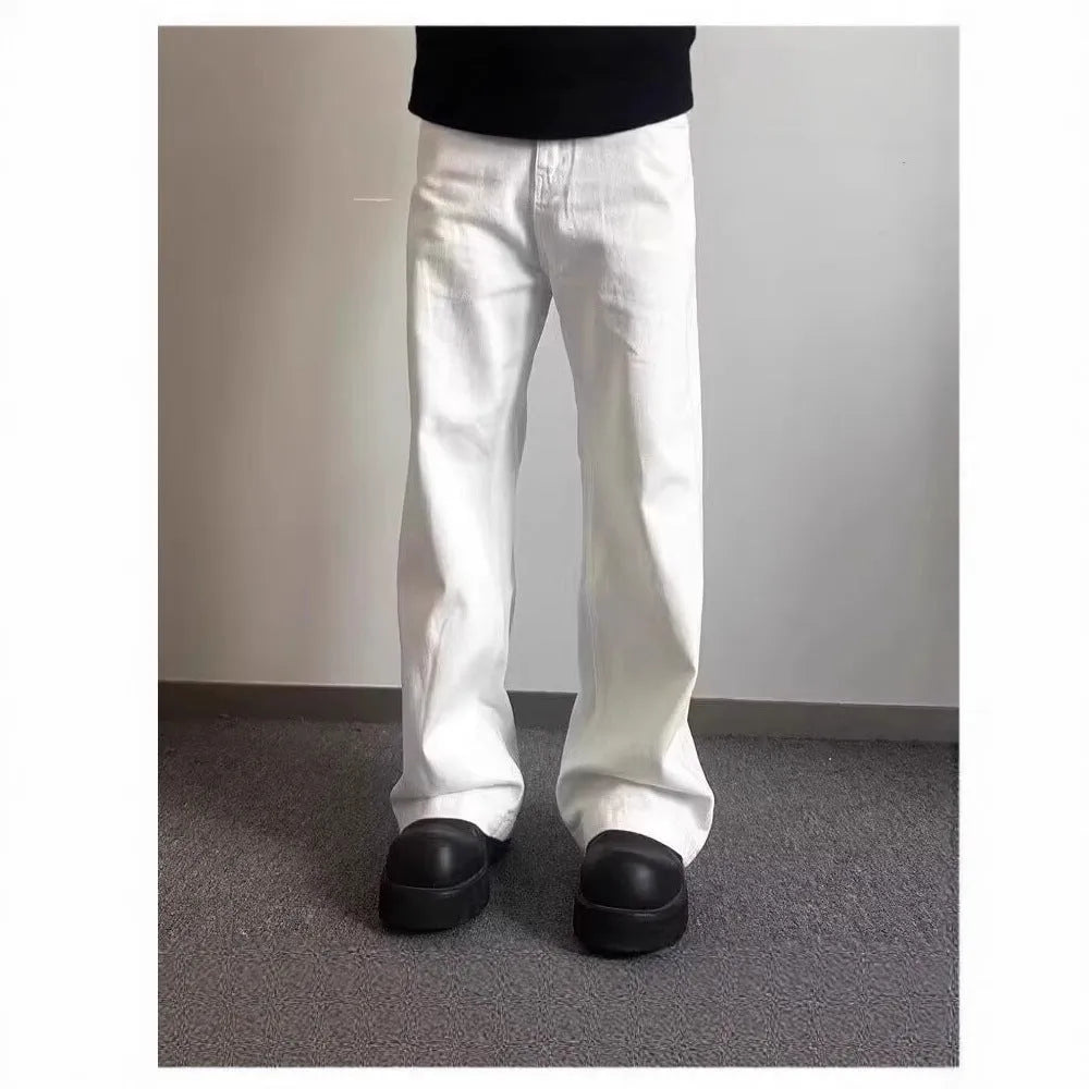 Men's straight leg white cotton denim jeans with wide leg opening and zipper fly