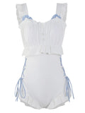 Women's milky white backless one-piece nylon swimsuit on a model, showing sleeveless and tight fit design.