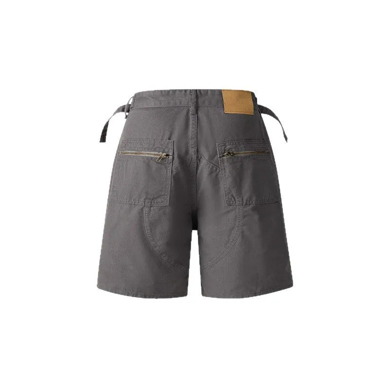Retro style loose fit workwear shorts in washed cotton cloth, shown in grey, green, camouflage and blue colour options.