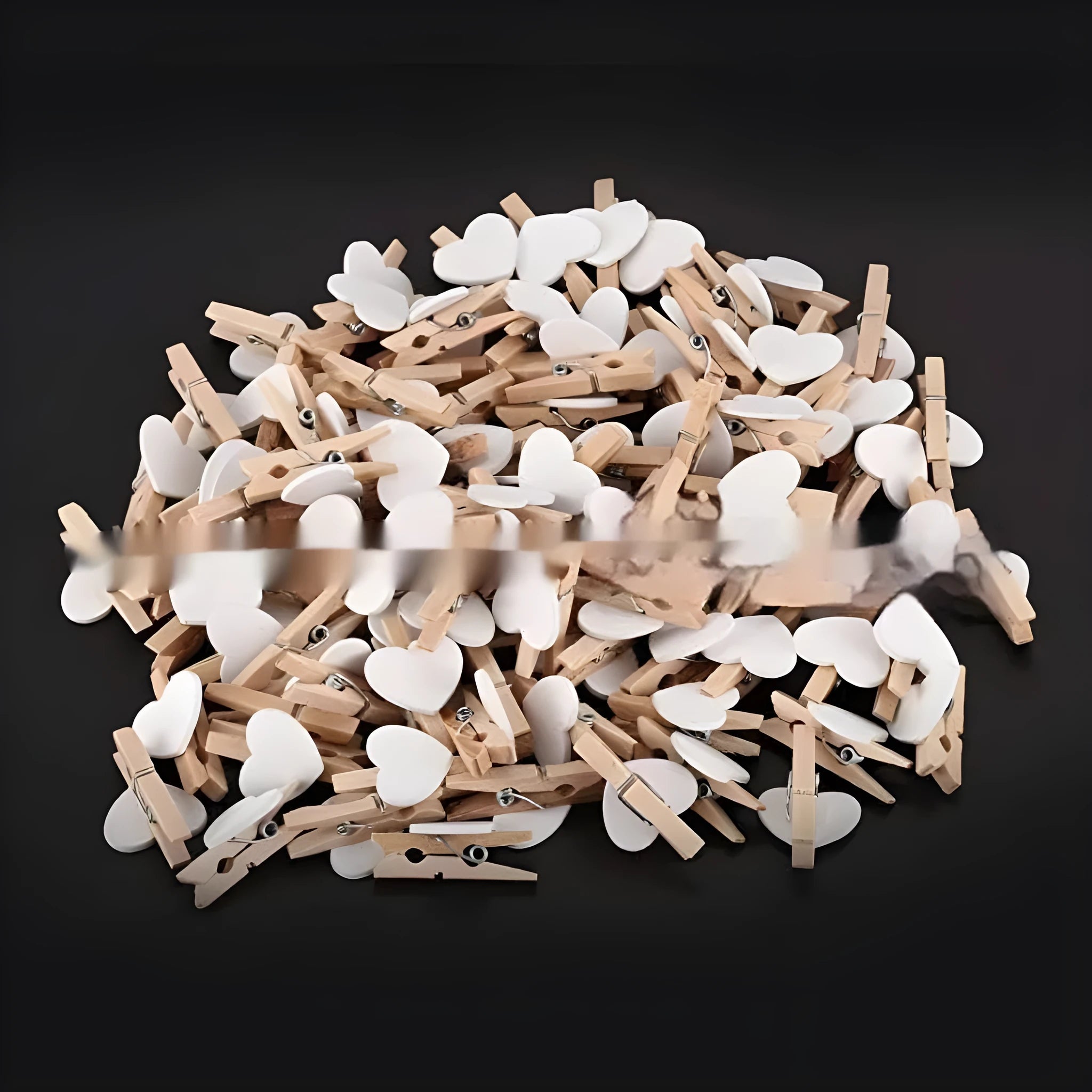 Small solid wood heart-shaped clips in five colours with modern simplicity styling