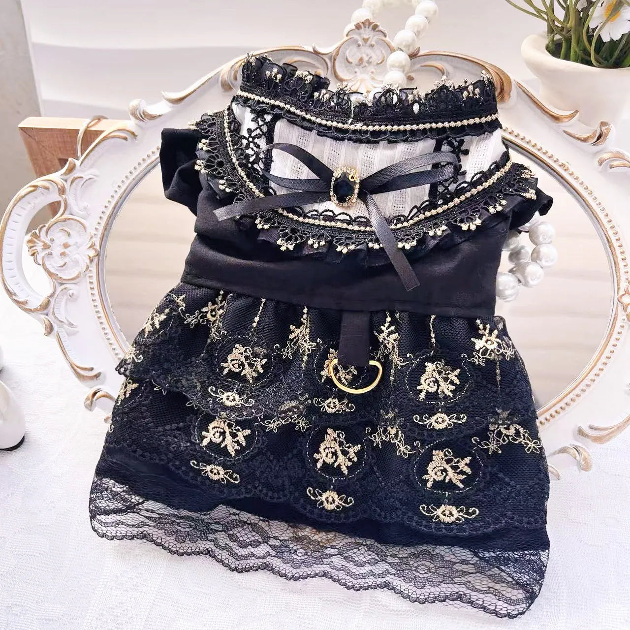 Golden gothic princess style polyester skirt costume for cats and dogs showing size range from XS to XL