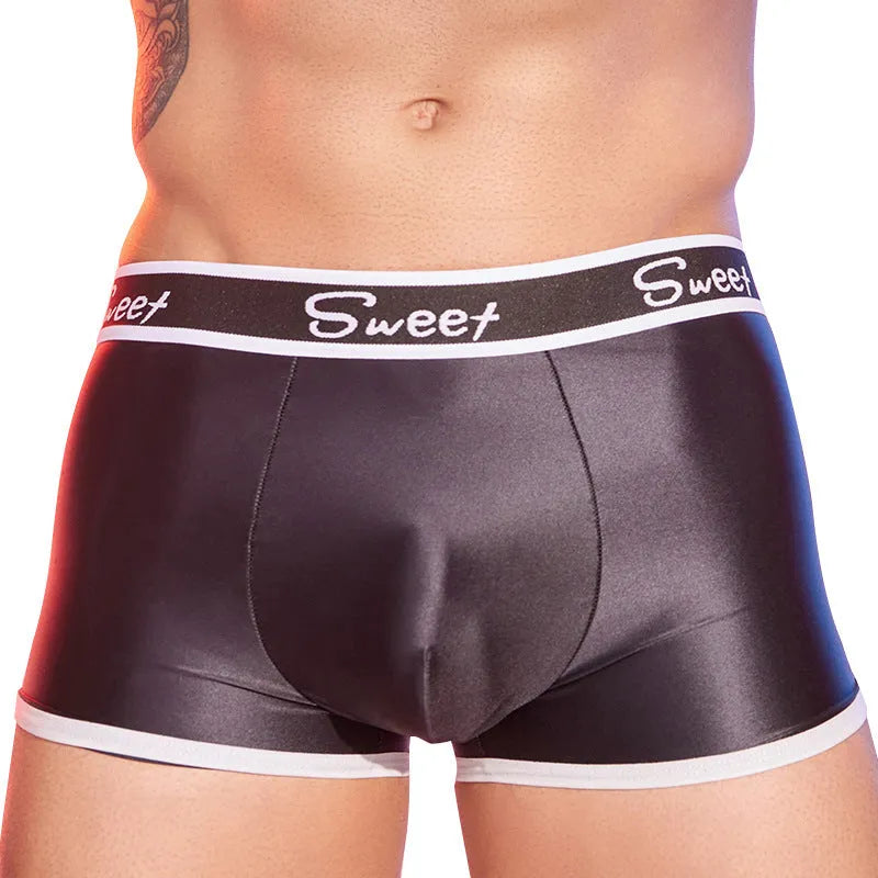 Men's shiny silky nylon boxers in black, white, and sapphire blue colours showing free size fit