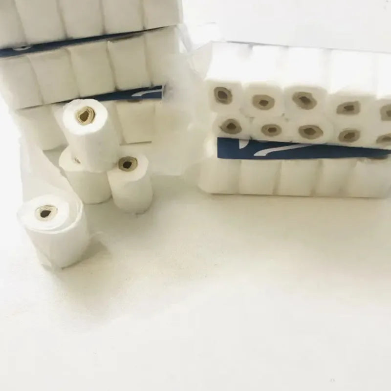 Miniature paper simulated tissue roll model for dollhouse play, measuring 30mm by 15mm by 80mm.