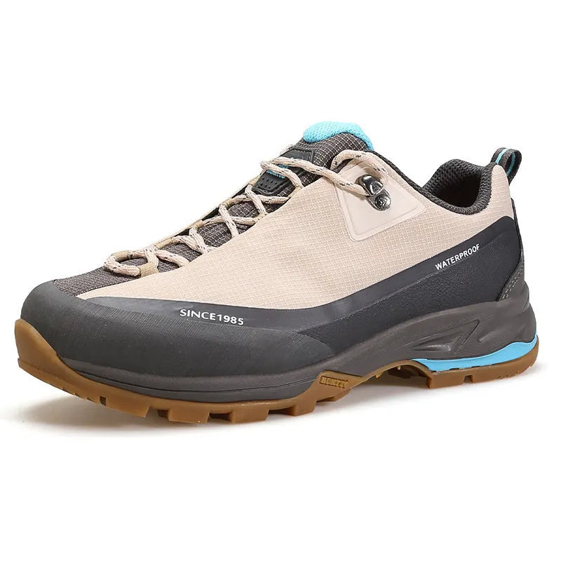 Men's low-top casual hiking boots in black with leather mesh upper and lace-up front.