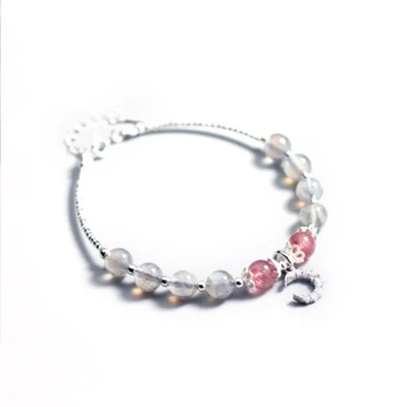 Moonstone bracelet with crescent moon charm on adjustable extension chain