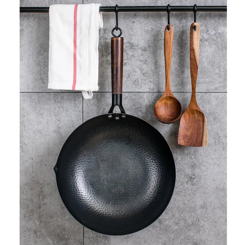 Black handmade traditional iron wok with wooden handle, 32cm diameter with lid.