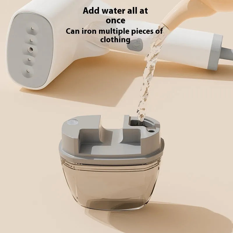 Blue handheld garment steamer with water tank and power cord for portable clothes wrinkle removal