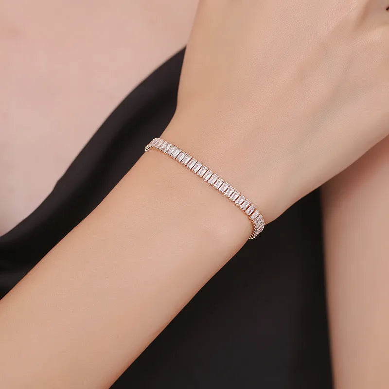 Geometric quadrilateral women's bracelet in brass with zircon stones in champagne gold finish