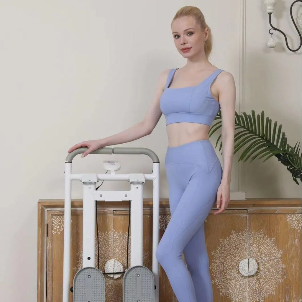 White folding treadmill with climbing frame attachment for multi-function home fitness exercise