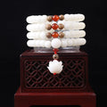White jade Bodhi beads bracelet showing 6x8mm beads in one of nine available decorative styles