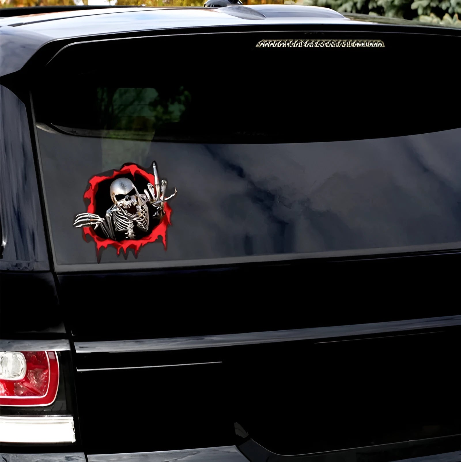 Reflective metal skull car sticker with colourful broken shell design measuring 15cm by 14cm