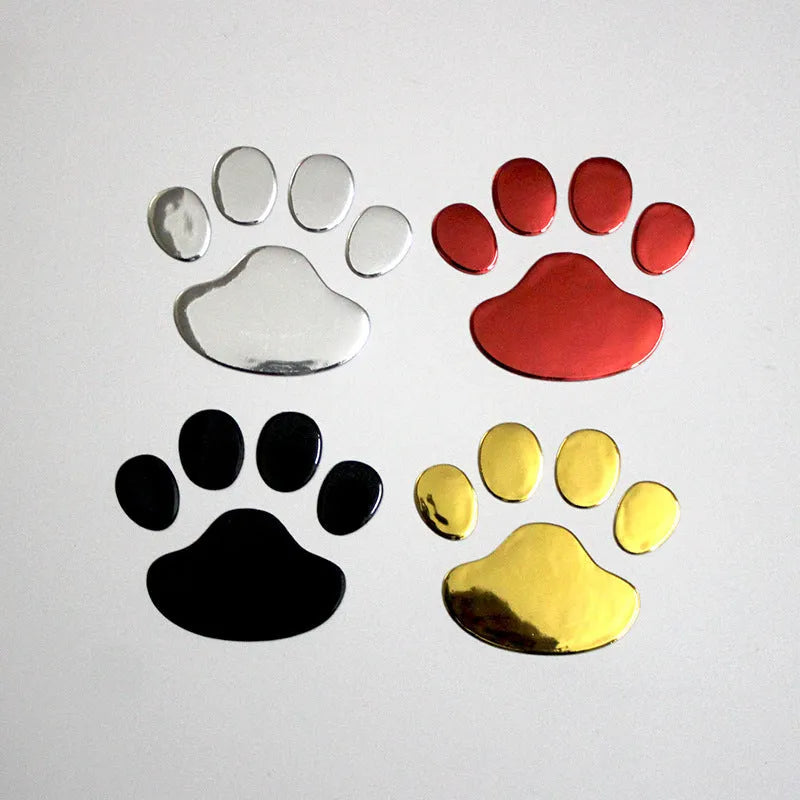 PVC hand-shaped brush dog footprint car sticker on a vehicle bumper in black colour.
