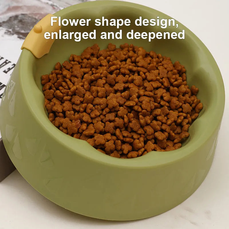 Green plastic double pet bowl with flower shape and separate food and water compartments.