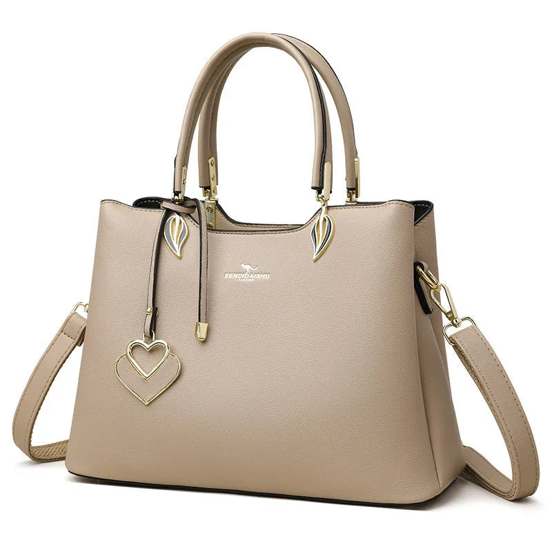 Women's messenger bag in PU leather with multi-layer shoulder strap and sewing thread detailing
