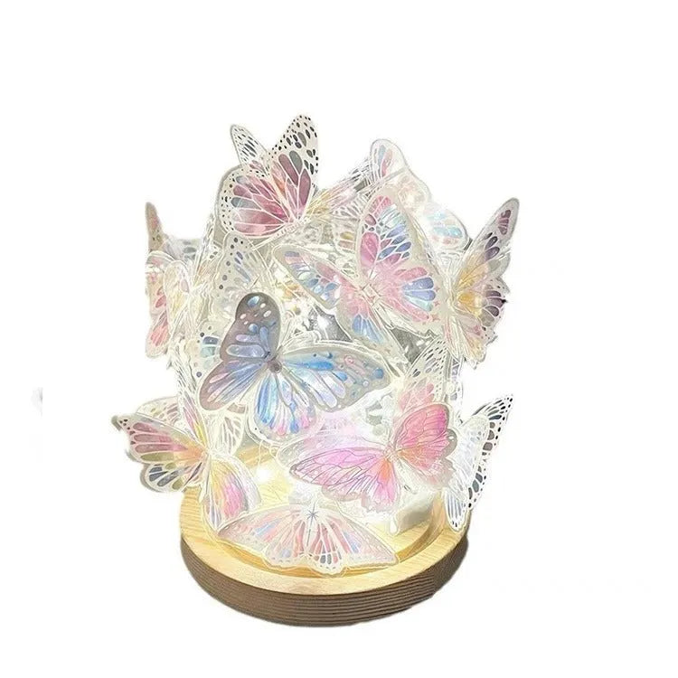Handmade butterfly night lamp with glass shade on raw wood base measuring 12x15cm