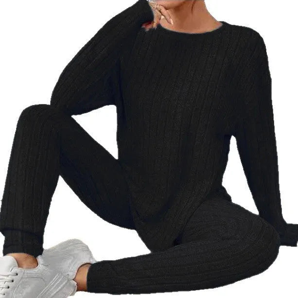 Black sunken stripe two-piece home exercise set with regular-sleeve top and matching pants