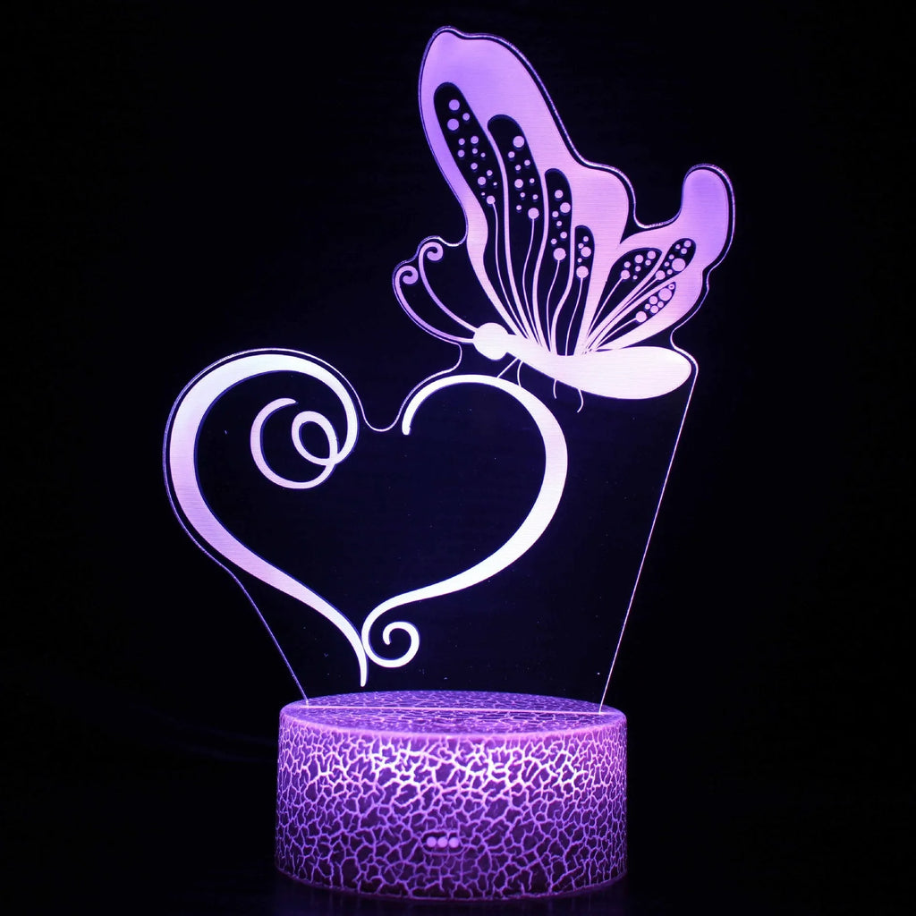 Acrylic 3D colourful touch USB table lamp with crack base design and LED light on a desk.