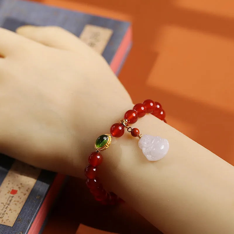 Red agate and amber bracelet with geometric Chinese design and Maitreya Buddha charm
