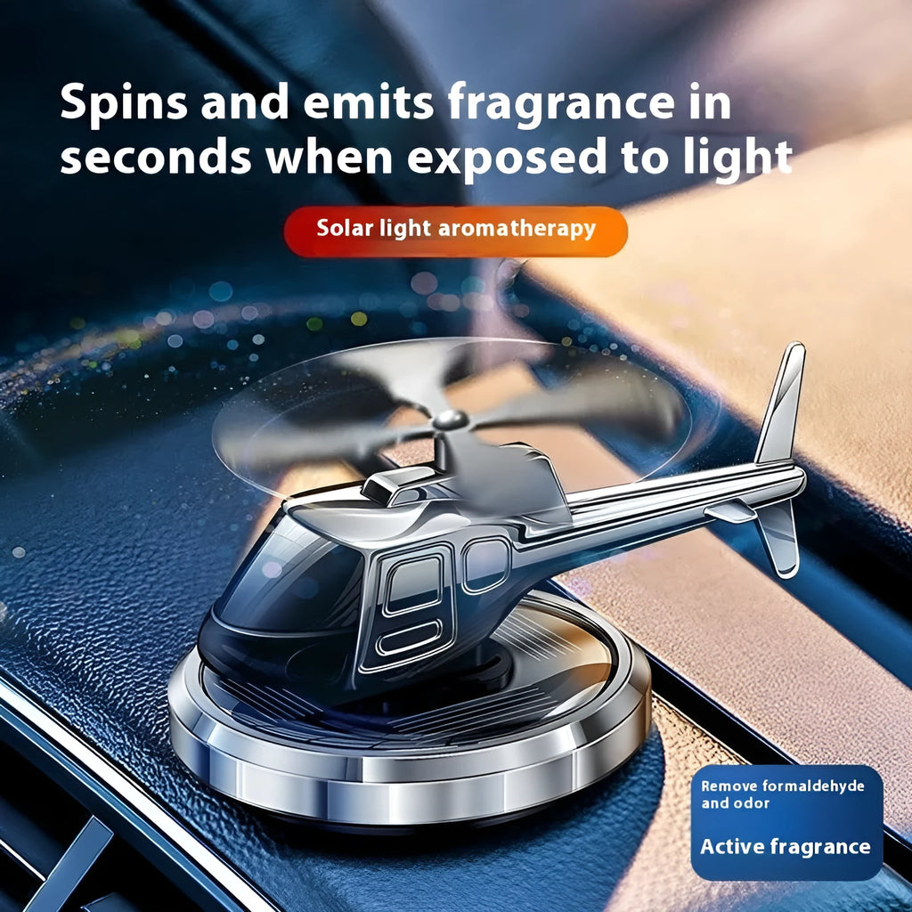 Metal solar helicopter car air freshener with rotating blades in silver, black, or blue colours