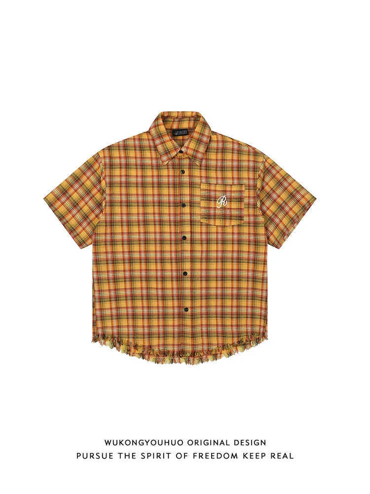 Yellow check short-sleeve plaid shirt with an embroidered chest pocket, shown on a hanger.