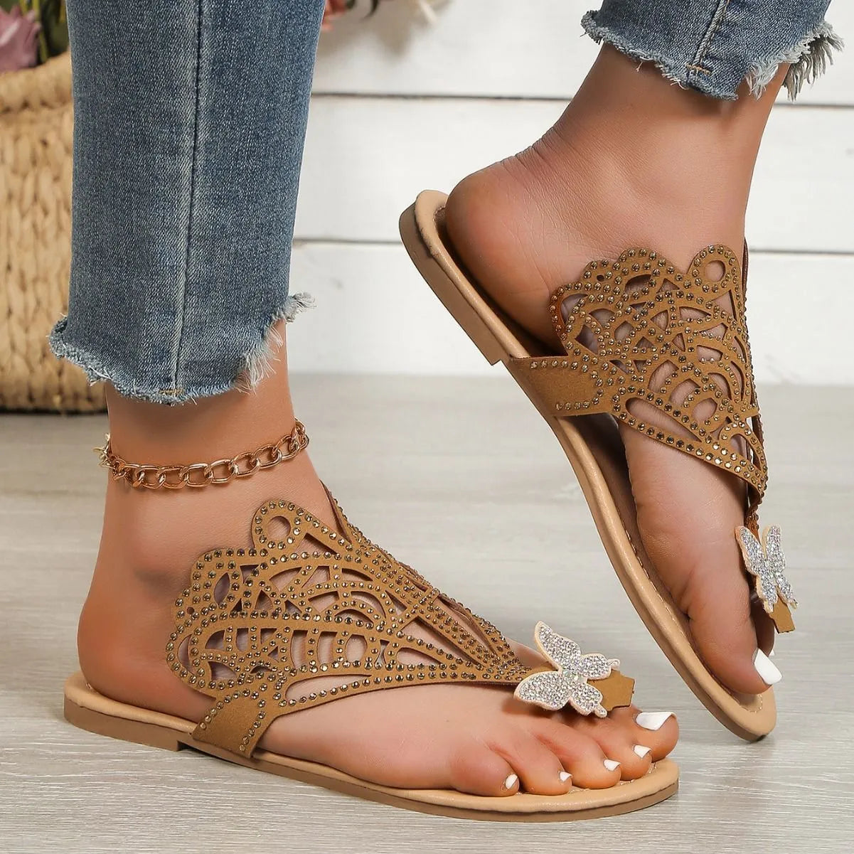Women's black slip-on sandals with rhinestone decoration and flip-toe design