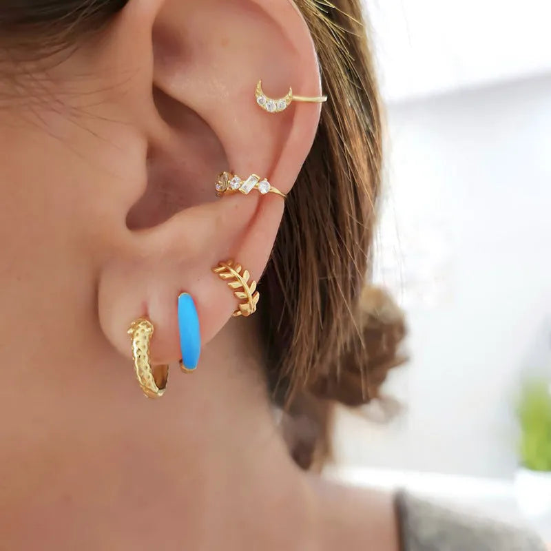 Geometric U-shaped oval curved earrings with colourful dripping oil epoxy resin finish on silver-plated copper.