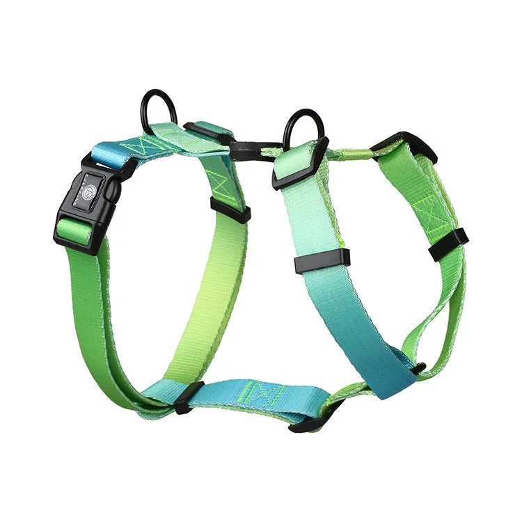 Adjustable polyester pet chest strap in a gradient colour pattern, showing the buckle and D-ring.