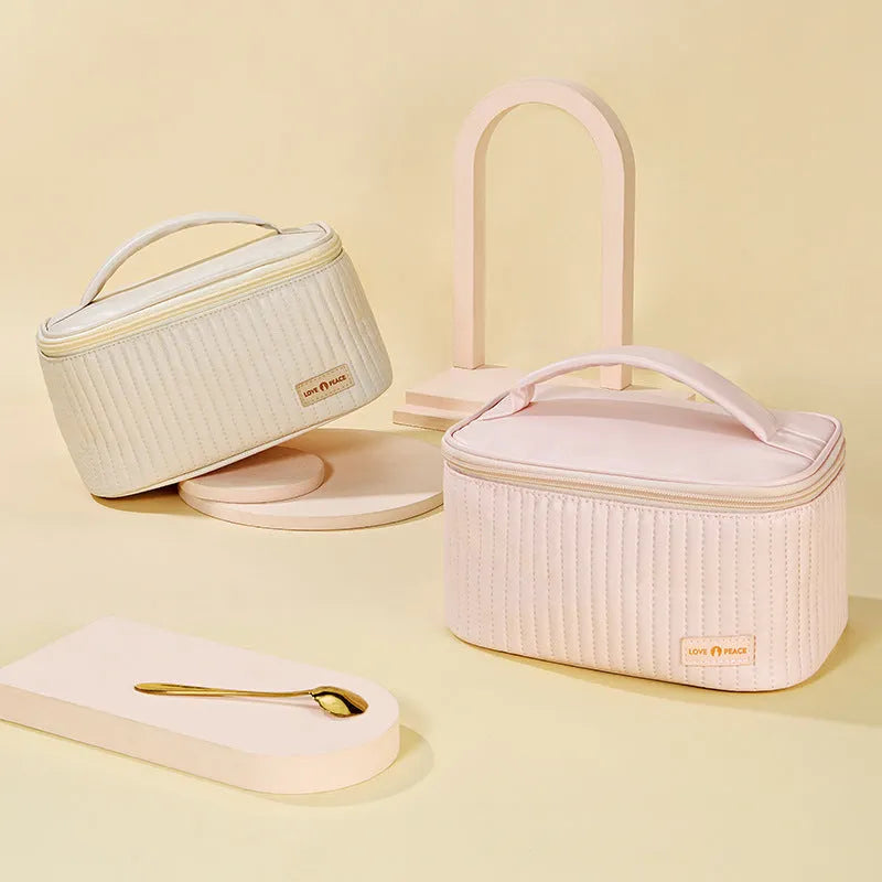Open-top PU leather makeup bag shown in a pastel colour from the range of six options.