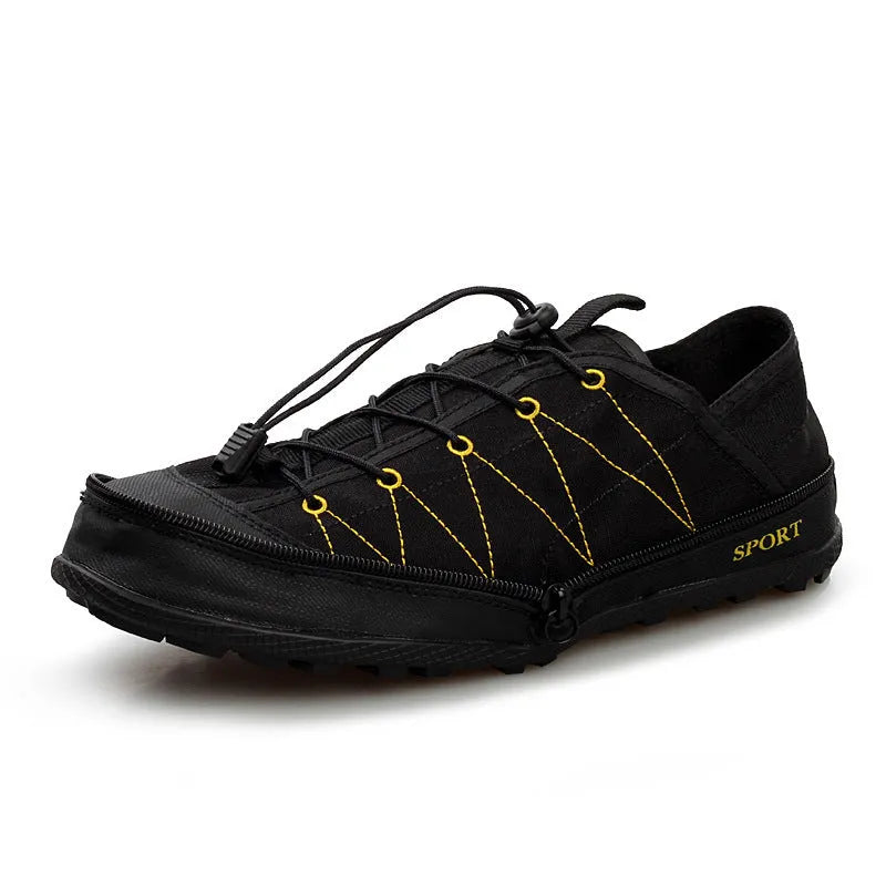 Orange portable folding outdoor shoes with a side zipper closure on a grey background